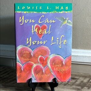 You Can Heal Your Life by Louise L. Hay - Purple & Red Heart Cover